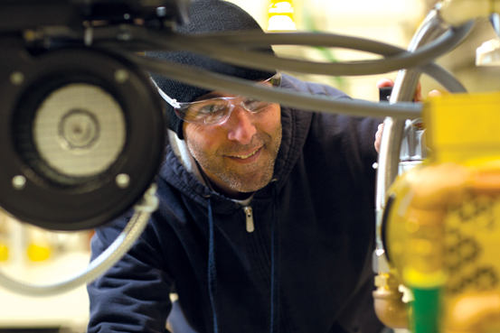Davis-Standard employee in a manufacturing environment